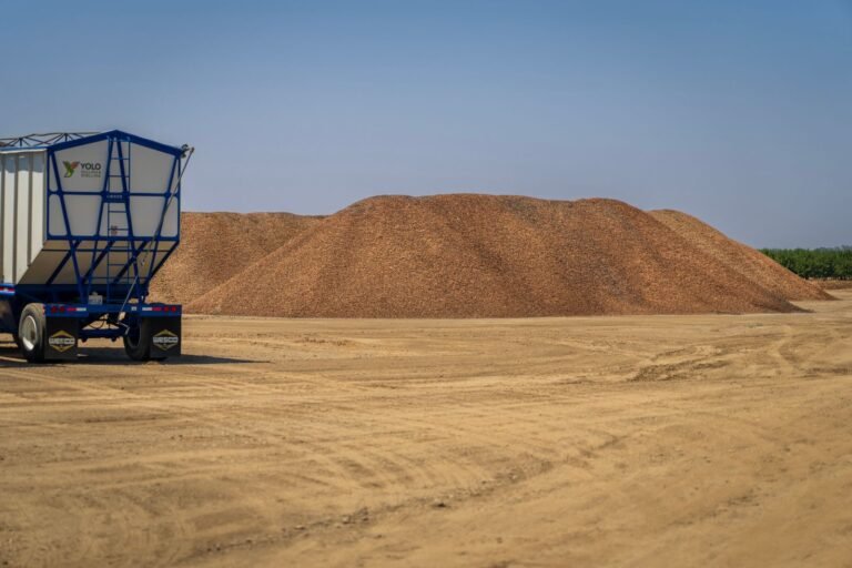 Large heap of building sand at an open materials yard